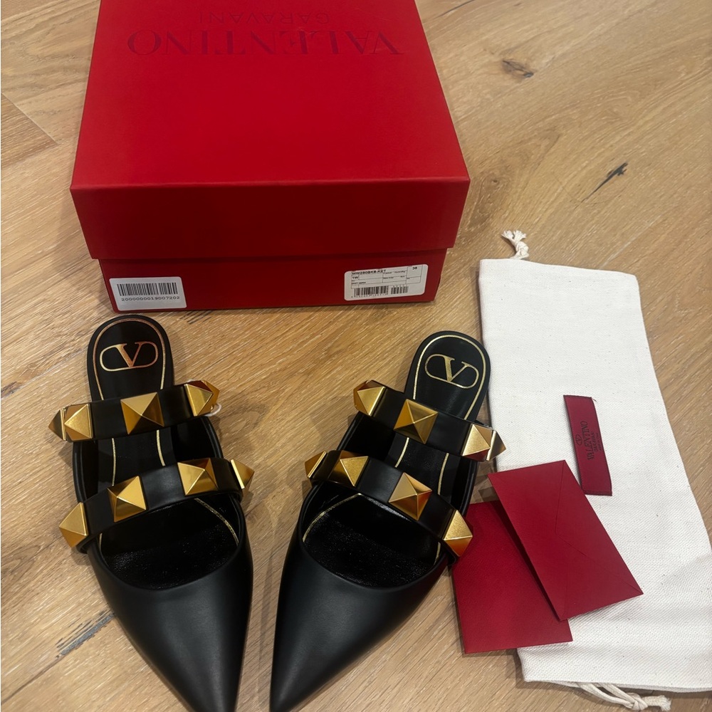 Valentino Garavani Black Leather Pointed Studded Mules with Gold Pyramid Studs